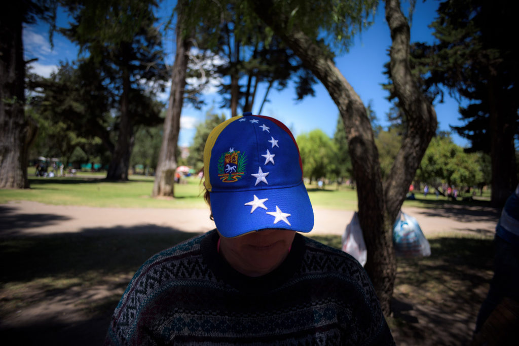 situación laboral migrantes venezolanos Quito Ecuador